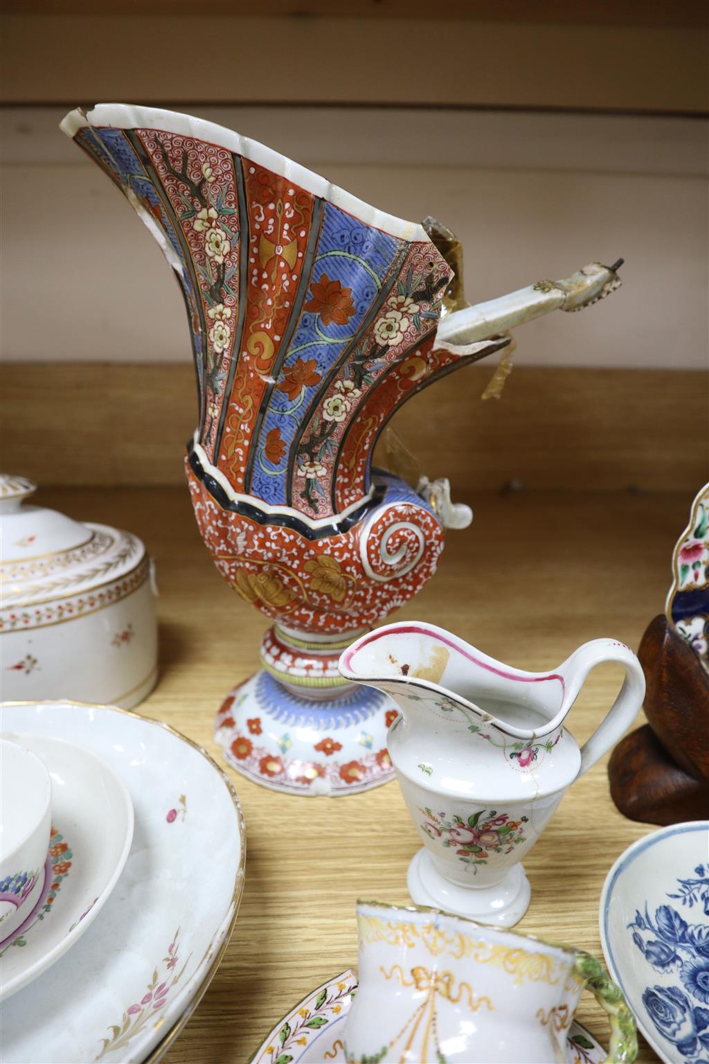 A group of mixed 18th and 19th century English and Continental porcelain, mostly damaged, for restoration